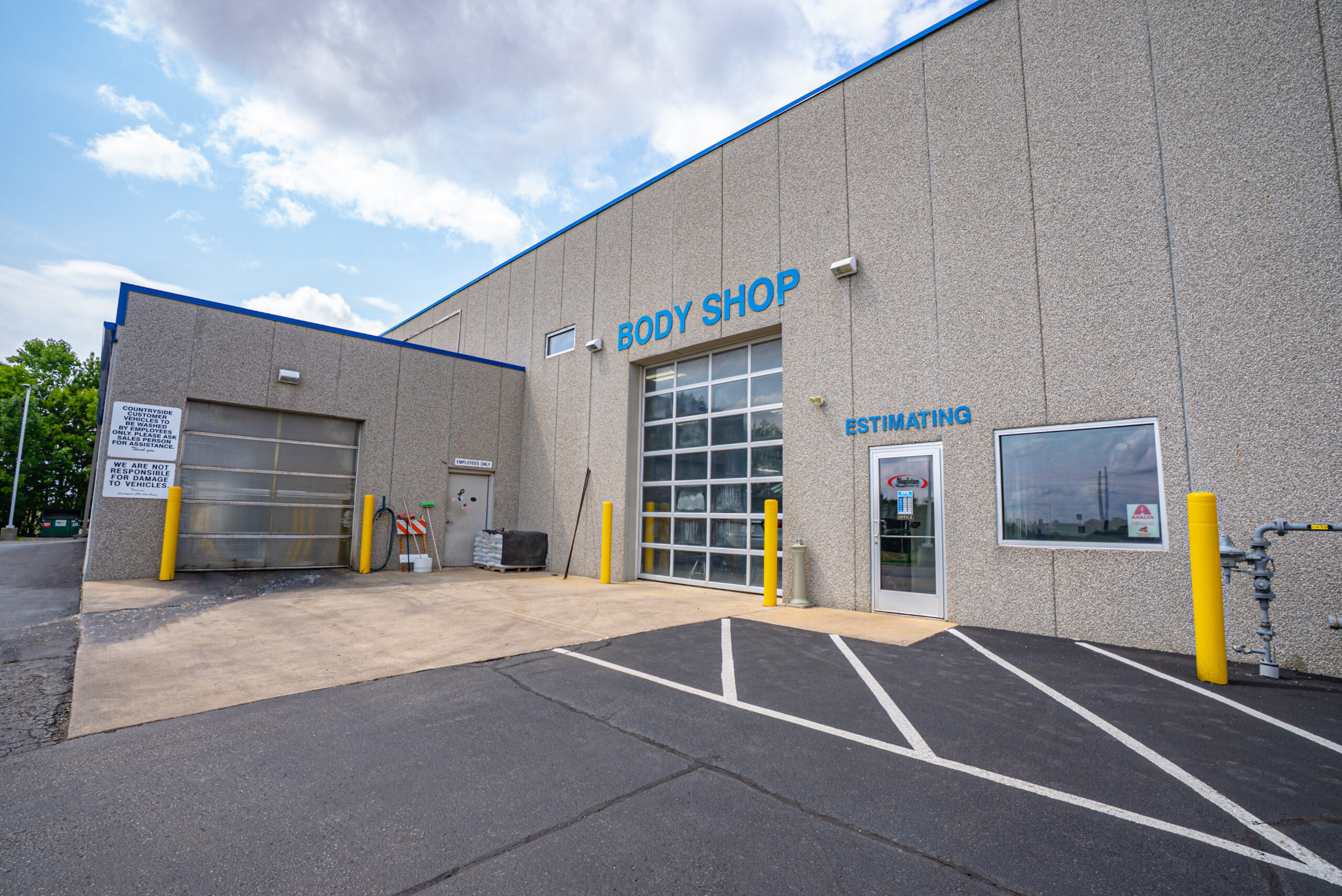 Napleton Collision Center technician working on vehicle repair in Beaver Dam WI